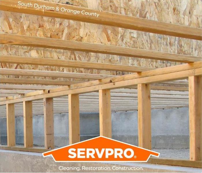 Crawlspace with exposed floor joists 